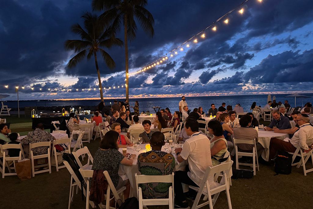 SAIL 2025 participants at beachside dinner during sunset. Image courtesy Simon A. Lee
